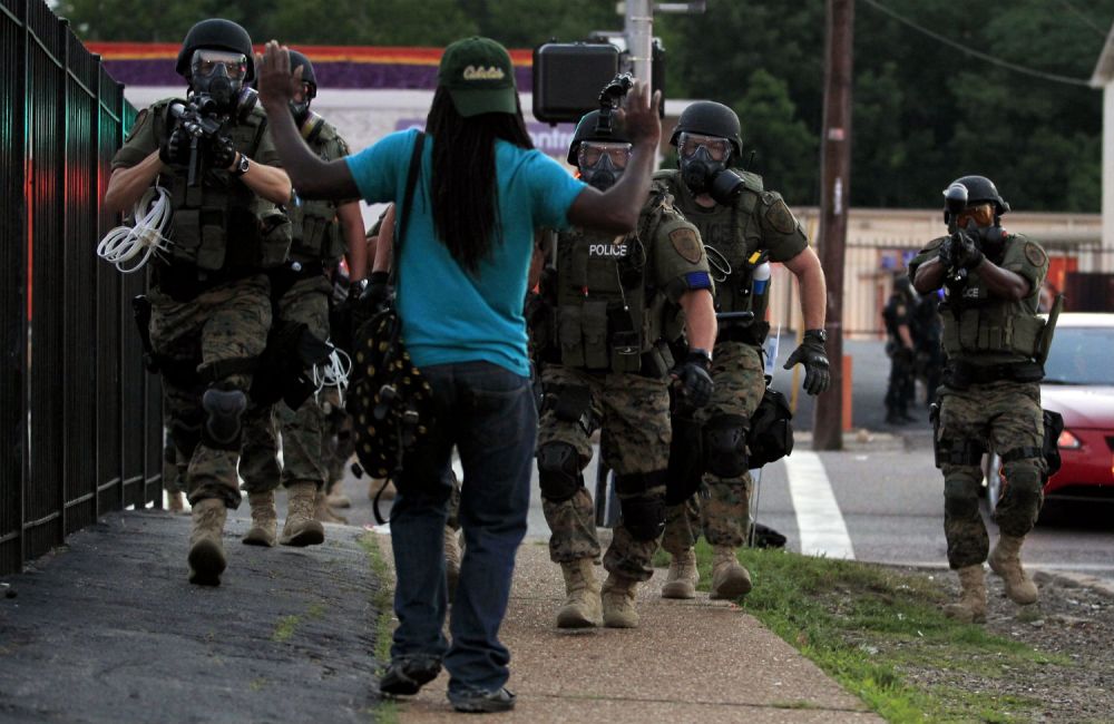 ferguson police guns drawn on civilian